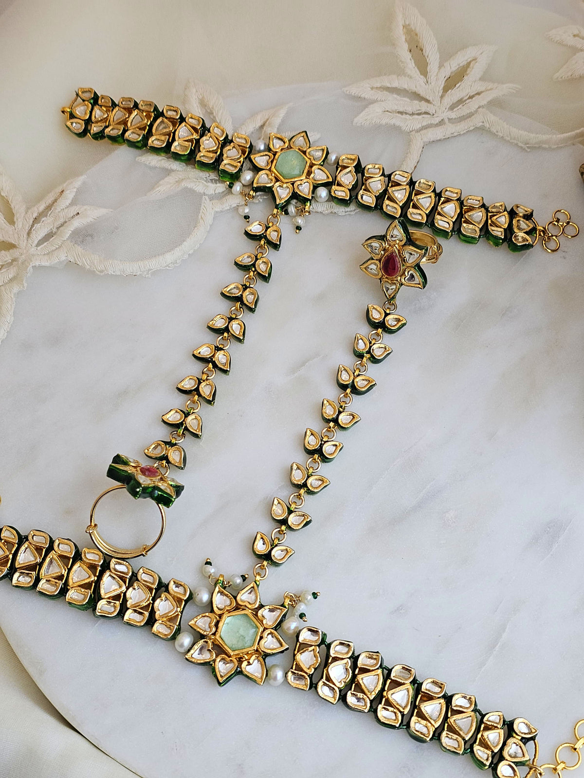 Hot pink and flourite green kundan hathphool