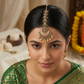 Green beaded kundan tikka
