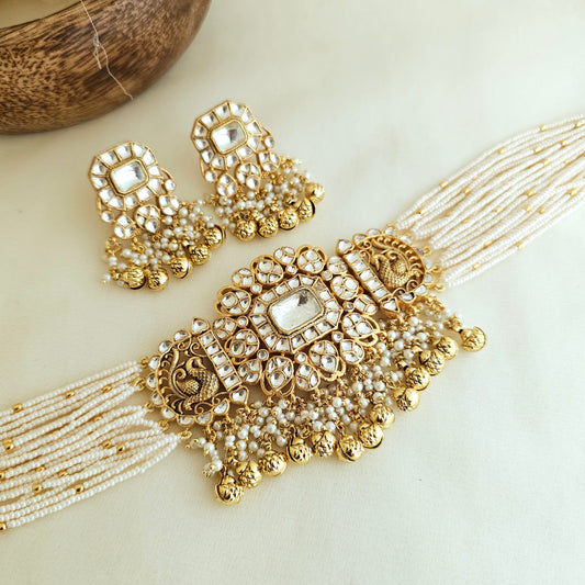 Pachi kundan peacock chokhar set