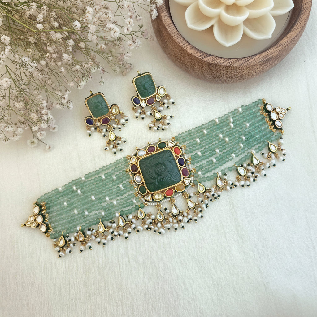 Emerald carved navratna chokhar set