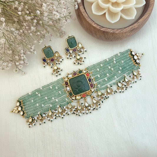 Emerald carved navratna chokhar set