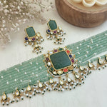 Emerald carved navratna chokhar set
