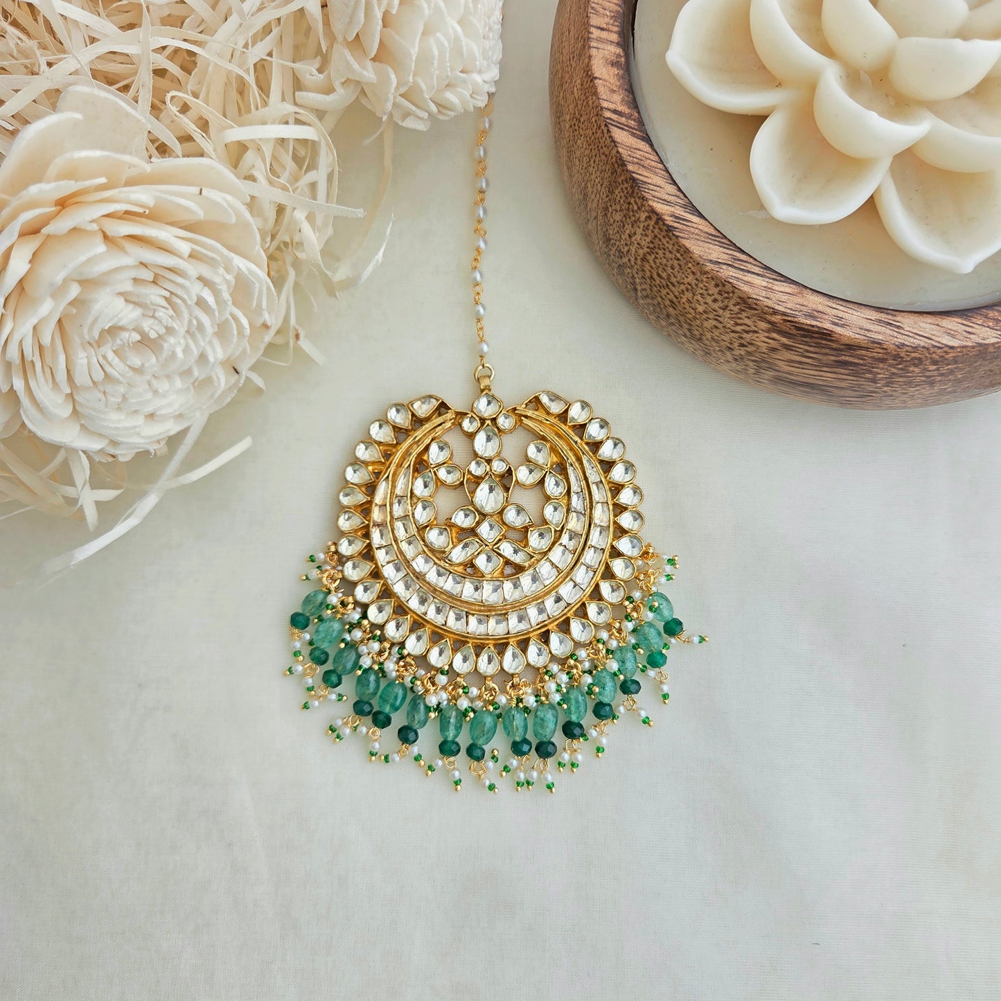 Kundan and emerald droplets maang tikka