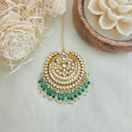 Kundan and emerald droplets maang tikka