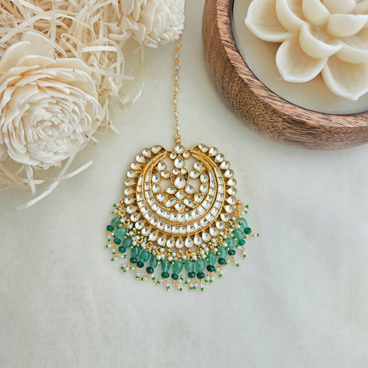 Kundan and emerald droplets maang tikka
