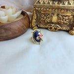 Peacock blue ring