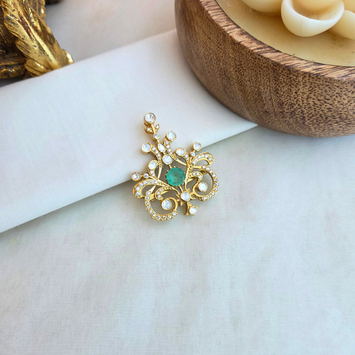 The silver crown brooch