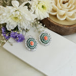 Coral and emrald halo studs