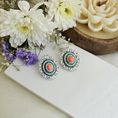 Coral and emrald halo studs