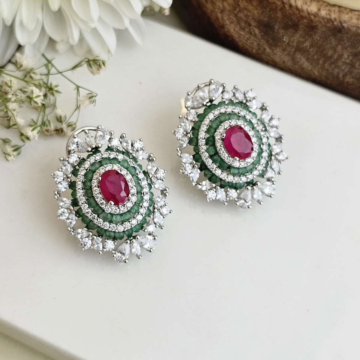 Ruby and floral emrald studs