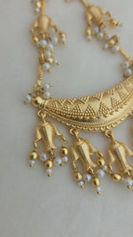 Beautiful long matsya golden earrings