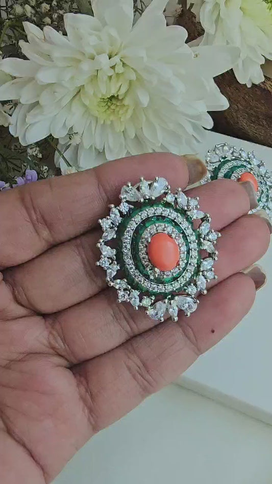 Coral and emrald halo studs