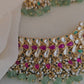 Pink kundan necklace with emrald droplets