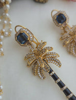 Palm beach statement earrings